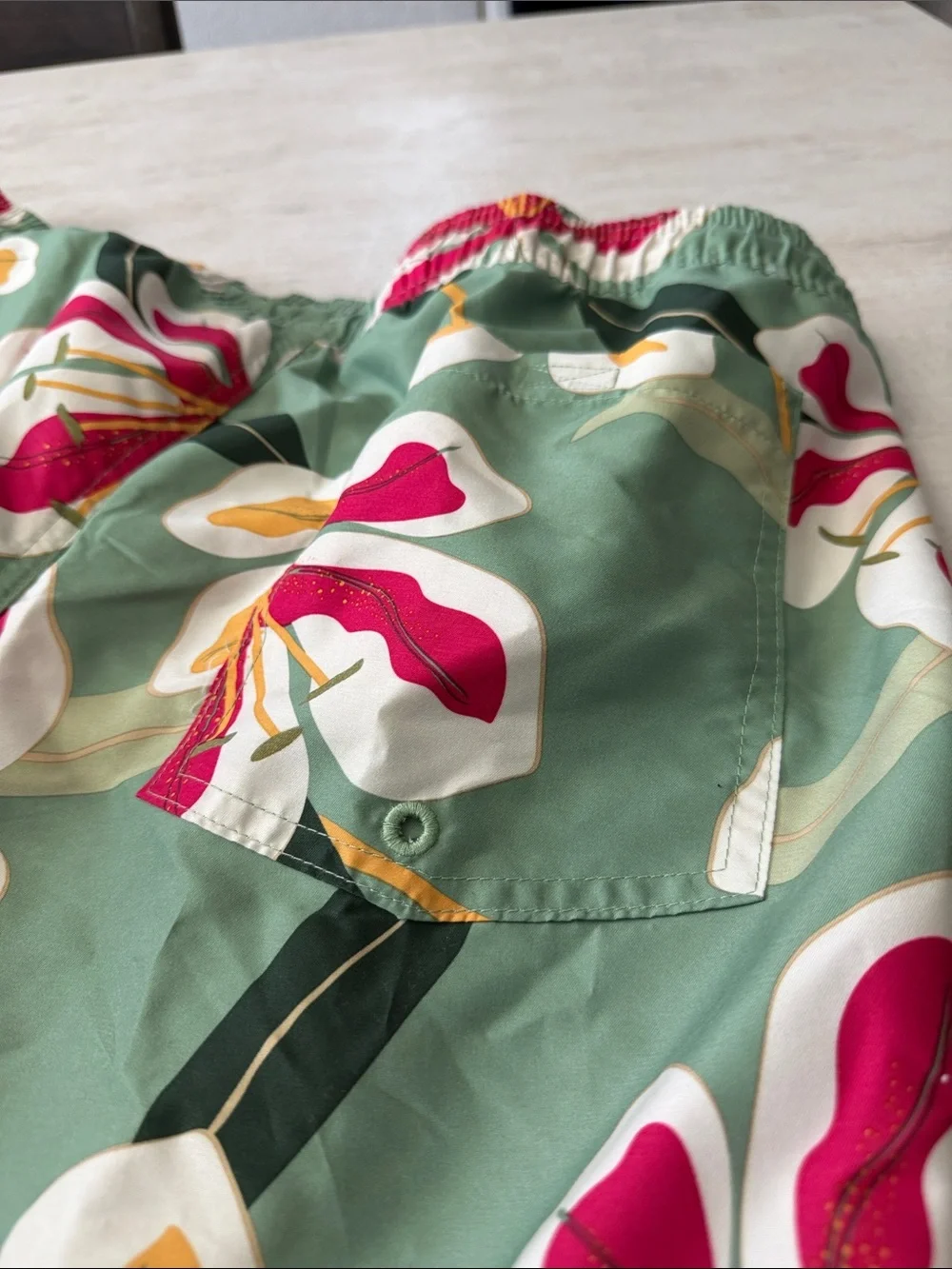 Original Use Green Floral Swim Trunks with Red & White Accents